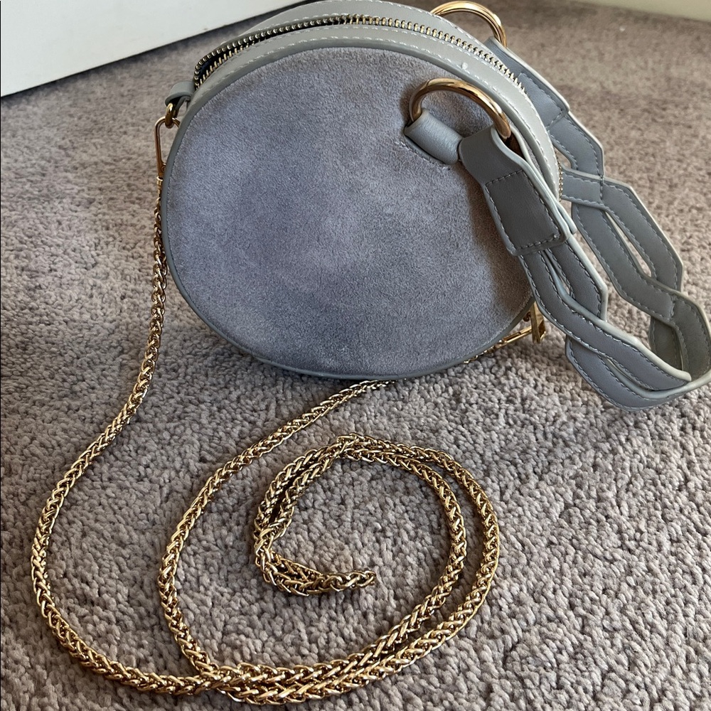 Anthropologie Round Gray Suede Crossbody Bag with Gold Chain